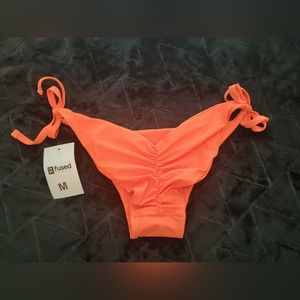New with tags and liner Fused chasing sunset orange bikini bottoms